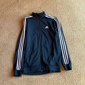 Black Adidas soccer jacket with the classic three white stripes on both arms